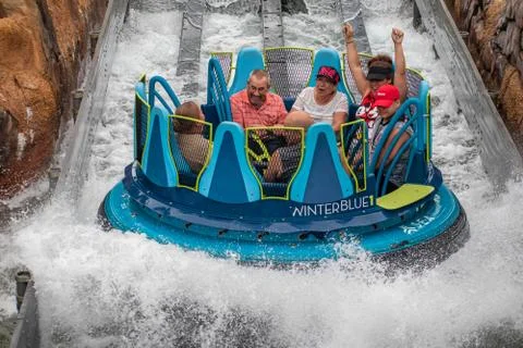 People having fun splashing in Infinity Falls at Seaworld Stock Photos