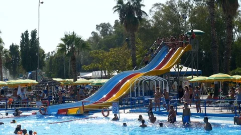 People having fun at swimming pool at Miami beach water park Stock Footage 79822996