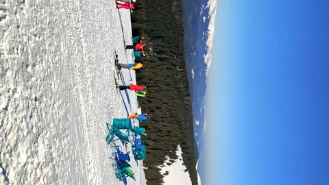 People having fun on the top of ski resort mountain Stock Footage 165056873