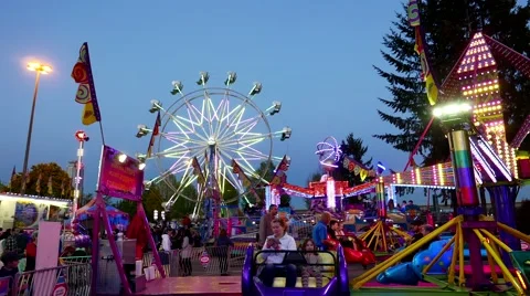People having fun at the West Coast Amusements Carnival Stock Footage 64957247