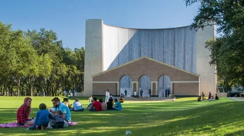People Having Picnic at Gerald D. Hines Waterwall Park in Houston TX Stock Footage 55176778