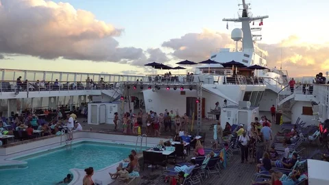 People having pool side party on the cruise Stock Footage 71137832