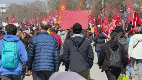 People hold up a placard reading "We are Ataturk's children" at rally, Stock Footage 305677702