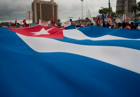 People holding a flag at a demonstration Stock Photos