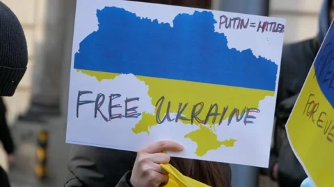 People holding Free Ukraine sign with Uk... | Stock Video | Pond5