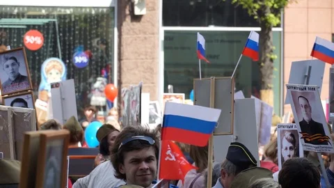 People holding Russian flags Stock Footage 112439185