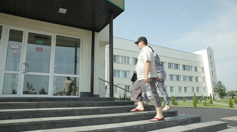 People hospitals entering into a building Video stock 59591004