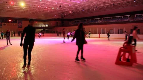 People ice skating indoors Stock Footage 82525357