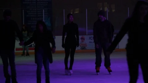 People ice skating indoors Stock Footage 82525494