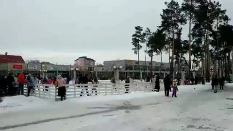 People Ice Skating at Towns Square in Eastern Europe Stock Footage 101848065