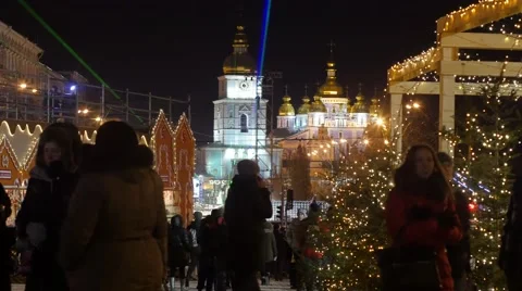 People at Illuminated Sophia Square Christmas Eve Laser Rays in a Dark Sky Stock Footage 59132324