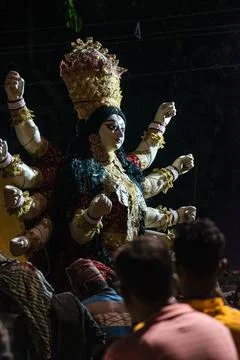 People immersing idol of Devi Durga on occasion of 'Bijoya Doshomi' Stock Photos