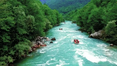 People in Inflatable Rafting Boats Riding Whitewater Rapids Stock Footage 162340736