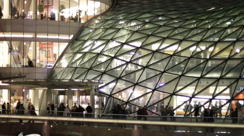 People inside and in front of modern shopping mall Stock Footage 1075584