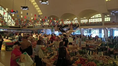 People inside the historic Halles Centrales du Boulingrin in Reims Stock Footage 338250872