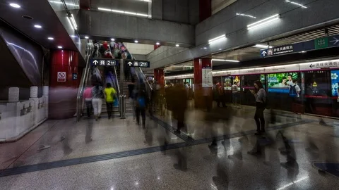 People inside one of Beijing subway station time lapse Stockbeeldmateriaal 119018676