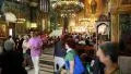 People inside Panagia Deksia Church in Thessaloniki, Greece HD Footage