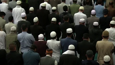 People in Islamic prayer Stock Footage