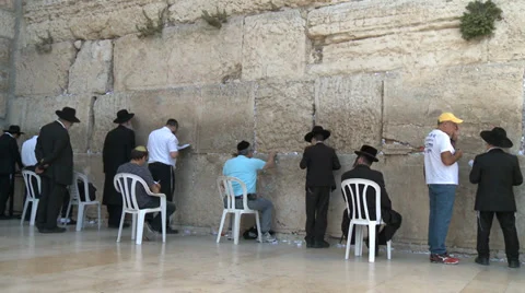 People in Jerusalem visit and pray at the Kotel Stock Footage 37687657