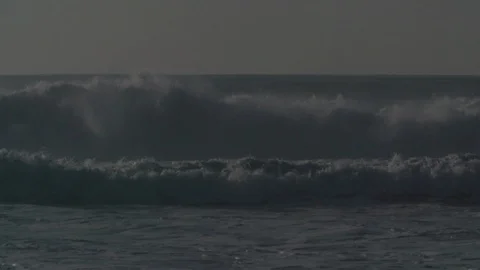 People in jet ski passing between the waves - Slow motion Video stock 105343643