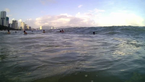 People jumping in sea waves Stock Footage 101768774