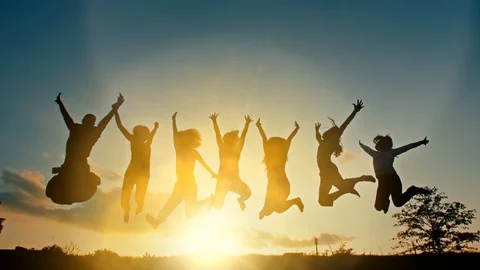 People Jumping at Sunset Stock-Footage 103323406