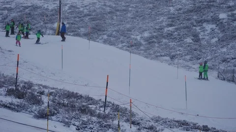 People learning skiing at Aviemore Ski Centre Scotland Stock-Footage 101374422