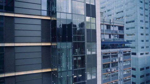 People Lifting Up by Transparent Glass Elevator to the top of the Stock Footage 111327611