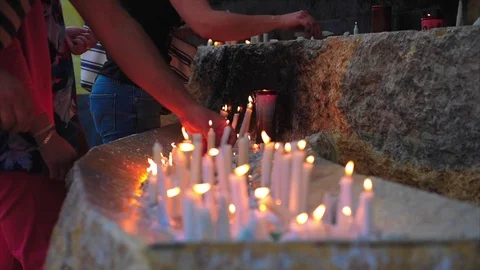 People Lighting Candles Video stock 79020219