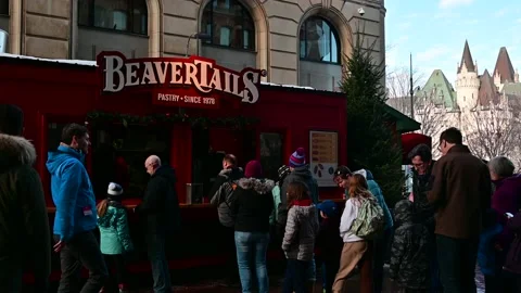 People Line Up in front of Beaver Tails Food Booth on Street, Downtown Ottawa Stock Footage 232959822