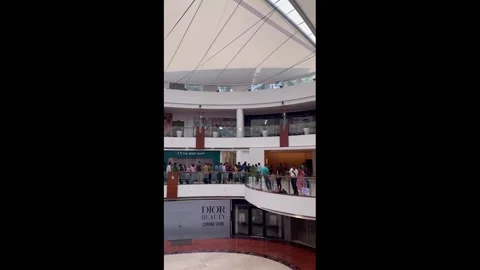 People Line Up Outside Apple Stores As IPhone 15 Released in India 2 Stock Footage 251566322