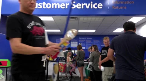 People line up for returning goods at customer service counter Stock Footage 67468963