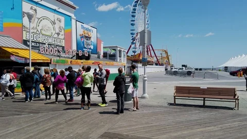 People lined up for Thrasher's Fries Stock Footage 108991656