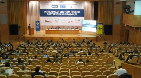 People listen to report at Russia's financial system: post-crisis future forum Stock Footage 2378578