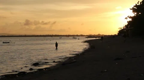 People on a littered/polluted beach in a developing country Video stock 10607942