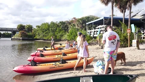 People Loading on Canoe Boat from Beach Shore Stock-Footage 158345934