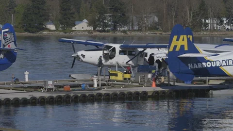 People Loading into Seaplane Stock Footage 147943521