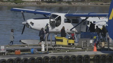People Loading into Seaplane Stock-Footage 148163237
