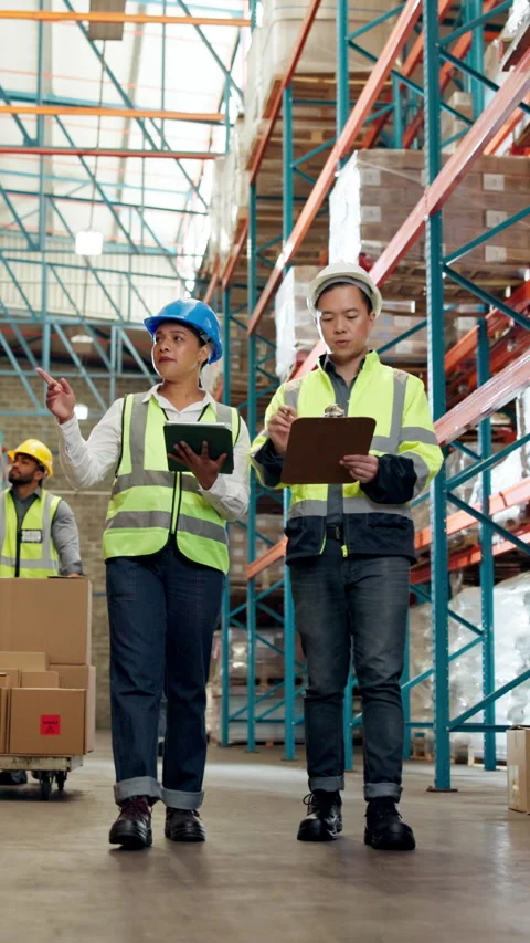 People, logistics and checking stock with tablet in warehouse for shipping Stock Footage 340451821