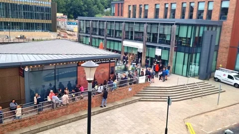People in Long Queue at Durham City Uk Passport Office Hmpo Stock Footage 225349447