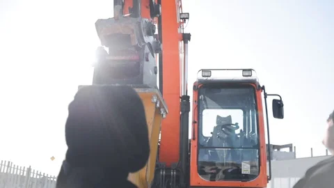 People look at the excavator Stock Footage 124946429