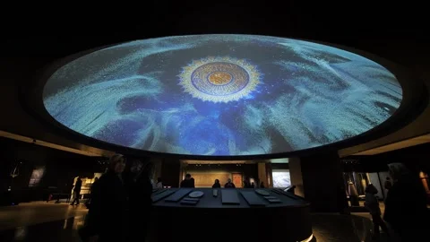 People look at projection ceiling screen - video mapping exhibition, Istanbul Video stock 339778158