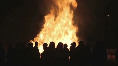 People looking at a fire at easter Stock Footage 24463193