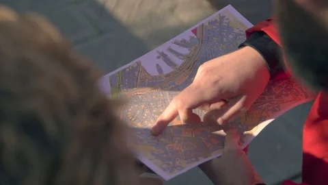 People looking at map together Stock Footage 88142035