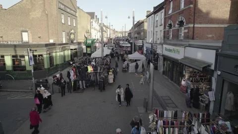 People looking at or choosing various products in shopping stalls Stock-Footage 167930765