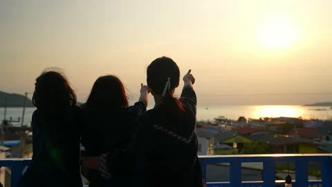 People looking point of view sea and city on sunset sky background Stock-Footage 237337696