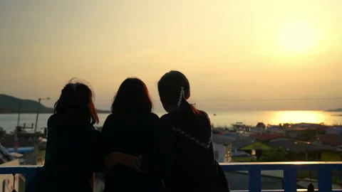 People looking point of view sea and city on sunset sky background 動画素材 237337751