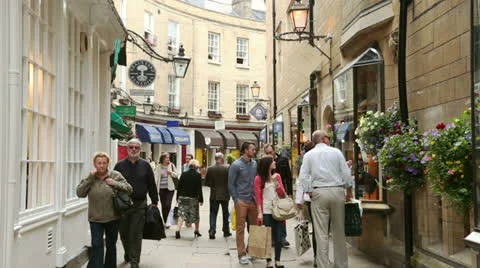 People looking at shops in rose crescent, cambridge, england Stock Footage 25597422