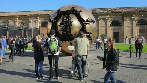 People looking to the Sphere within a Sphere, a bronze sculpture by Italian s Video stock 142967385