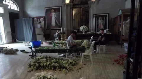 People make flower wedding arch inside Manila Cathedral, Intramuros, Philippines Видео 204060121